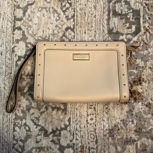 Kate spade cream wristlet wallet.